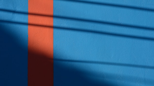 Photo blue and orange cement wall texture - background