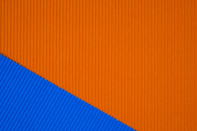Blue and orange corrugated paper texture