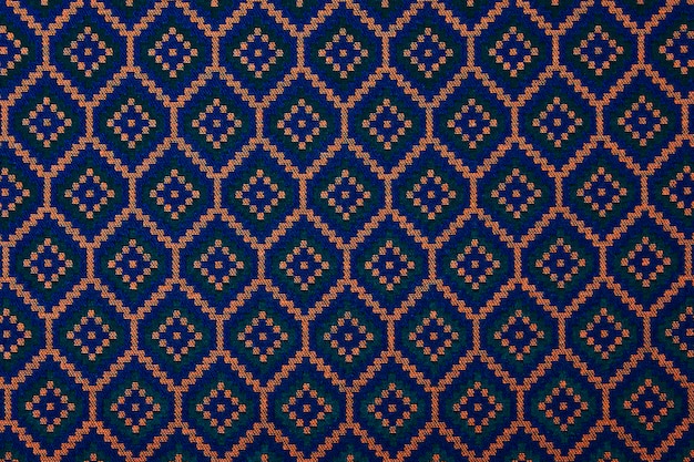 A blue and orange fabric with a geometric design.