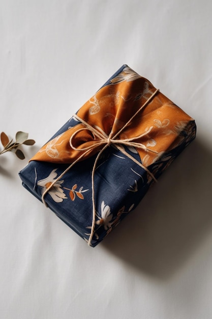 A blue and orange napkin tied with a string tied to it.