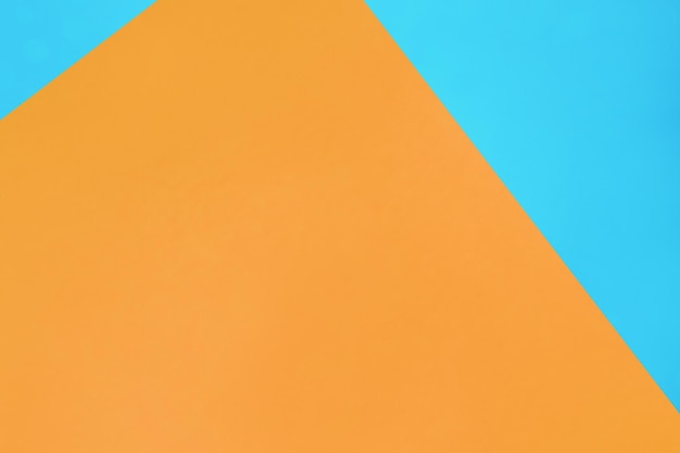 Blue and orange pastel color paper texture top view minimal flat lay background