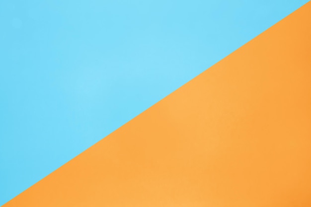 Blue and orange pastel color paper texture top view minimal flat lay background