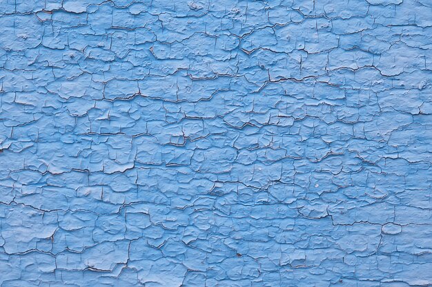 blue paint abstract vintage background, wooden old peeling surface