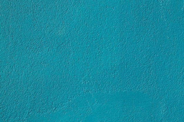 Blue painted concrete wall. Abstract texture for design