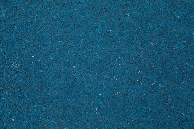 Blue painted ground covering outside in the daylight