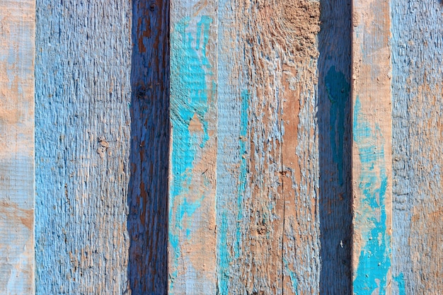 Blue painted vintage weathered wooden planks closeup. Abstract wooden background