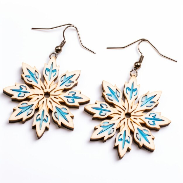 Photo blue painted wood snowflake earrings with engraved ornaments