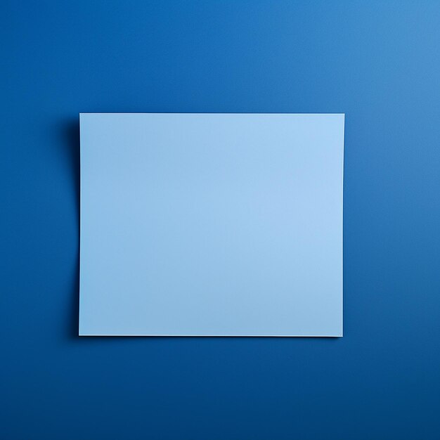 A blue paper on blue plain background