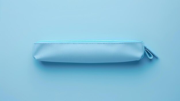 A blue pencil case with a zipper It is made of soft leather and has a smooth surface
