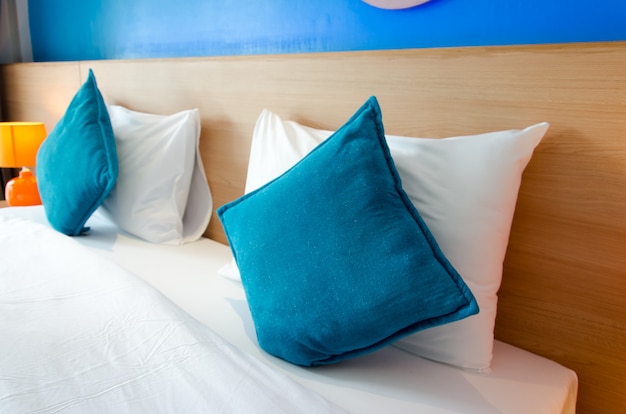 Blue pillow on the bed