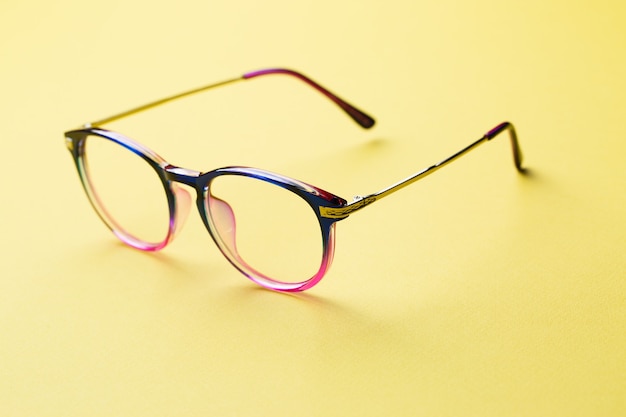 Blue and pink rim of glasses