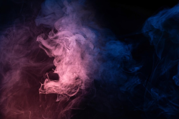 Blue and pink steam on a black background