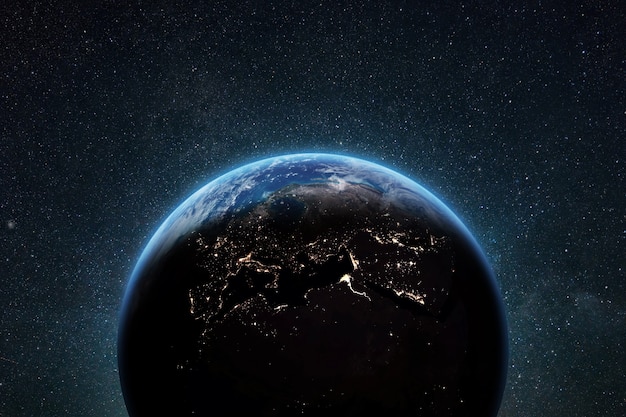 blue planet earth with skyline and bright city lights in deep space with stars.