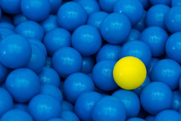 Blue plastic ball in the playground