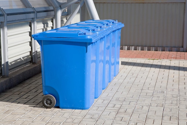 Blue plastic recycling bins