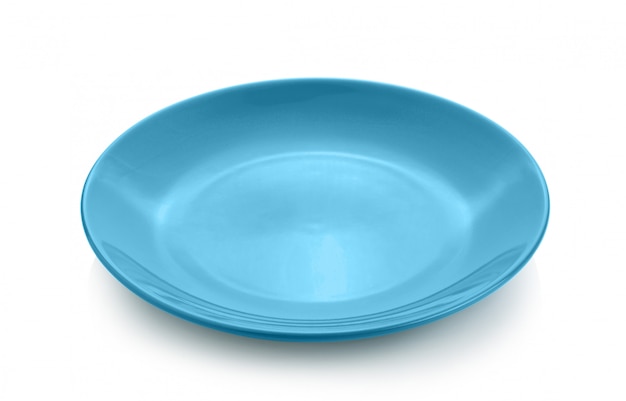 Foto piatto blu su superficie bianca