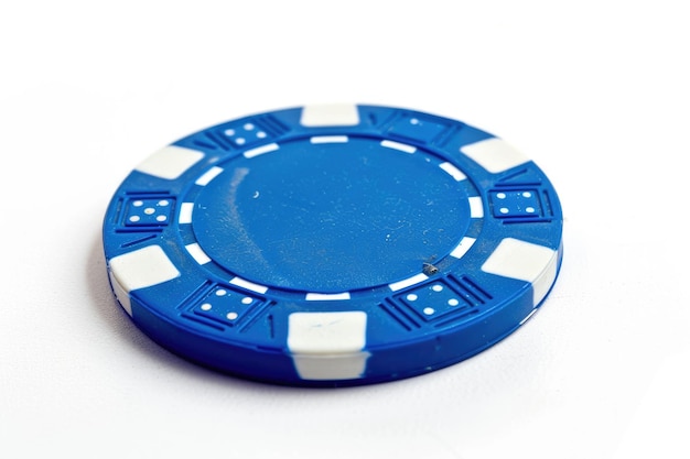 Photo blue poker chip isolated on white background for gambling and game concept plastic round circle