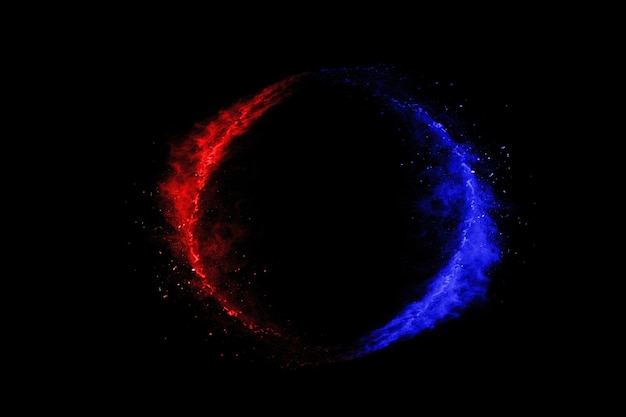 Blue and Red color powder explosion on black background