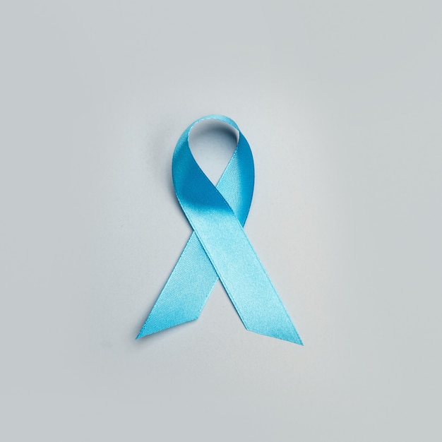 A blue ribbon on a gray background