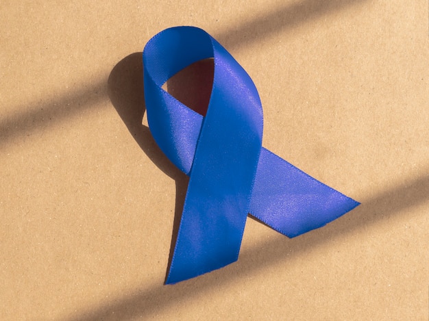 Blue ribbon medical bow of men health