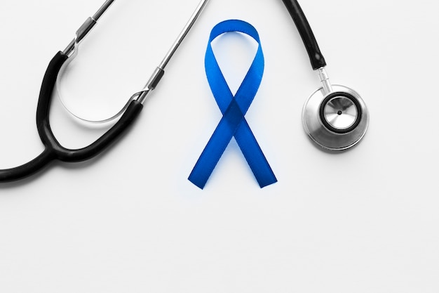 Blue ribbon below stethoscope