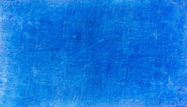 青のざらざらした質感の苦しめられたグランジの抽象的な背景