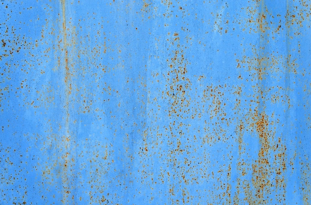 抽象的なテクスチャと青い錆びた金属の背景。