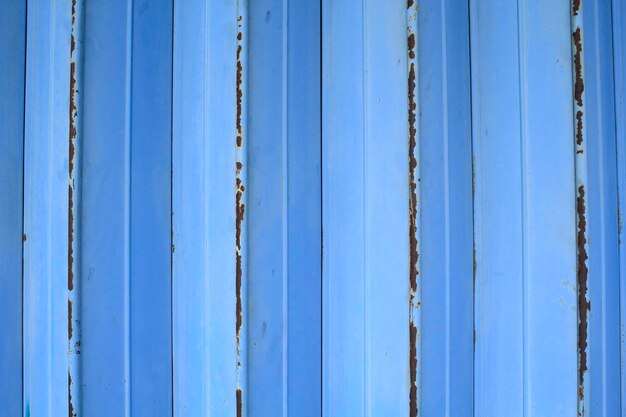 blue and rusty store gate roller door