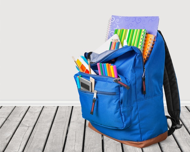 Photo blue school backpack  on   background.