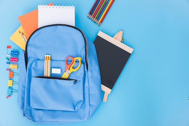 blue school bag backpack and accessories tools for children education