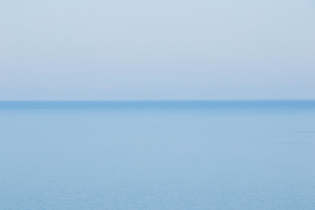 Blue sea horizon background, blue color gradient, view and landscape