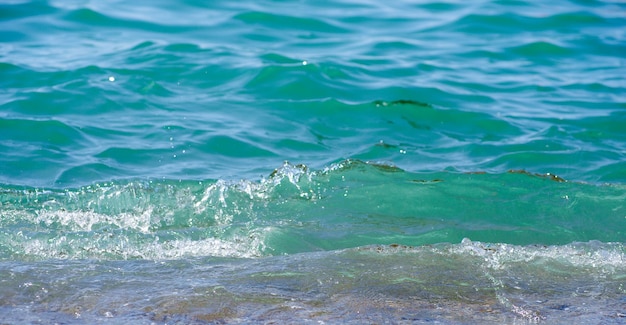 写真 青い海の水の背景テクスチャ