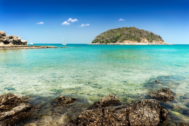 Blue sea and white sand beach in blue sky