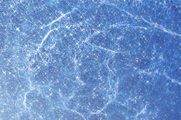 Blue shiny glitter textured background