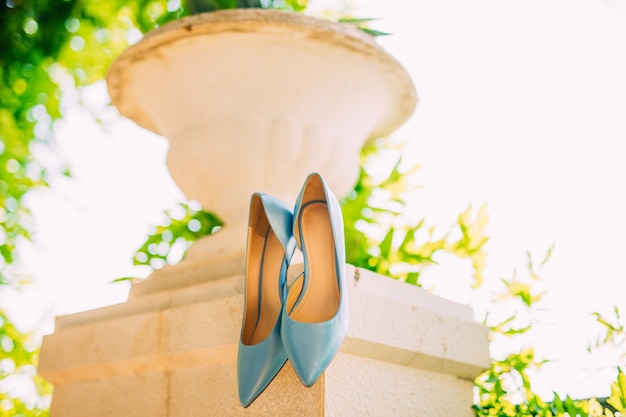 Blue shoes of the bride