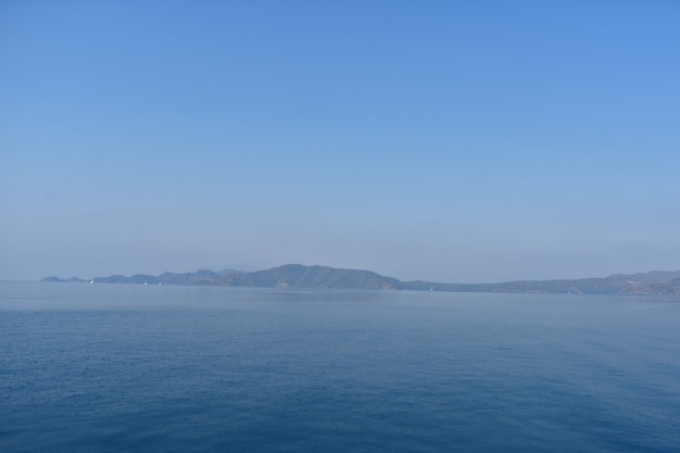 Blue silhouettes of mountains on the Aegean coast. Turkey