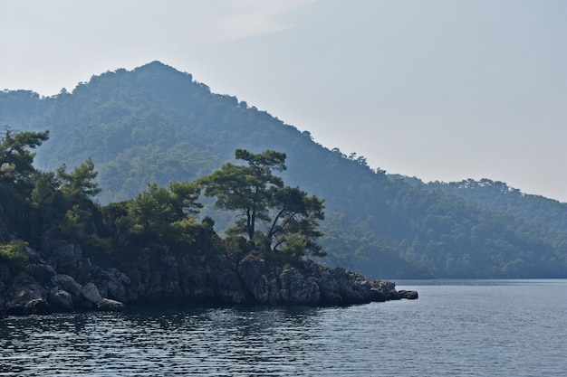 Blue silhouettes of mountains on the Aegean coast. Turkey