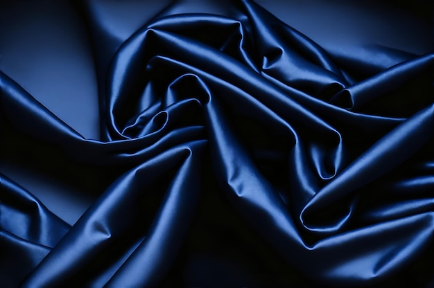 A blue silk draped over a blue background