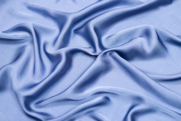 Blue silk or satin luxury fabric texture