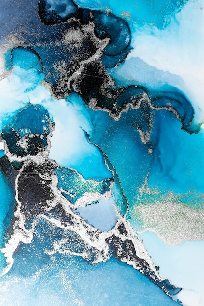 Синий серебряный абстрактный фон мраморной живописи жидкими чернилами на бумаге