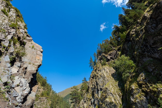 Blue sky among the rocks on the road to tusheti. georgia