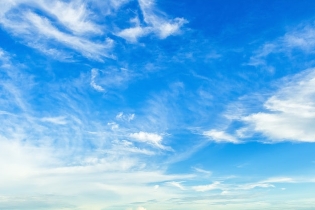 Blue sky background texture with white clouds.