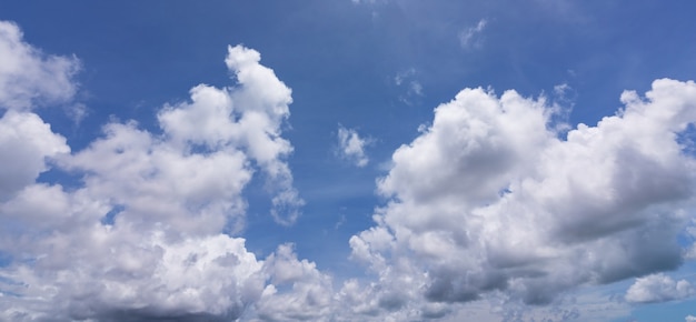 Blue sky background with clouds Natural daylight and white clouds floating on blue sky Clear sky nature environment.