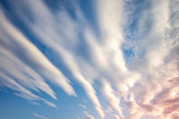 Blue sky background with tiny curly striped clouds in the evening Clearing day and Good windy weather