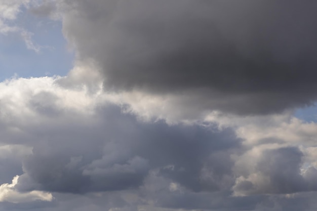 Blue sky background with tiny stratus cirrus striped clouds Clearing day and Good windy weather