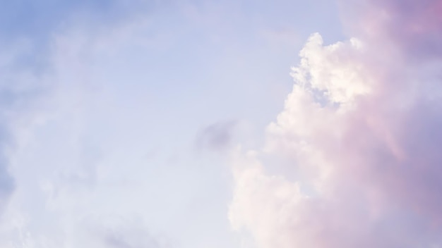 Blue sky background with white and pink clouds at sunset. High quality photo