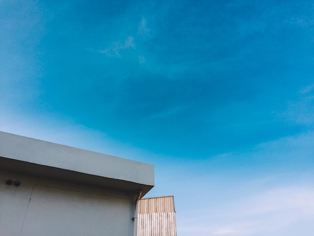 Blue sky above building background