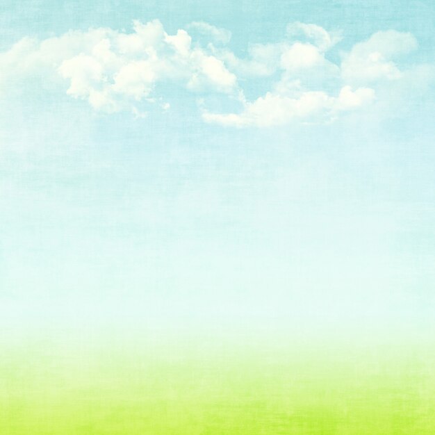 Photo blue sky, clouds and green field summer grunge abstract background