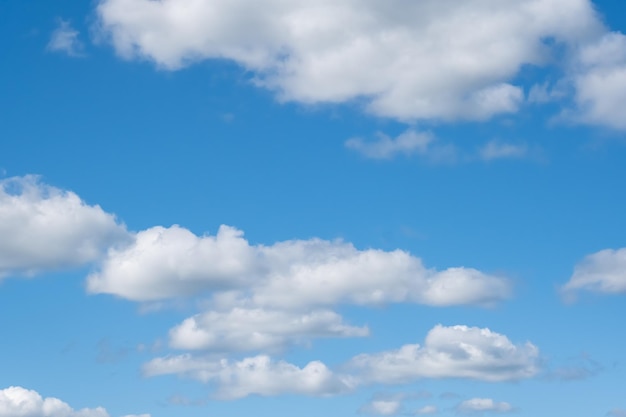 Blue sky and fluffy white clouds