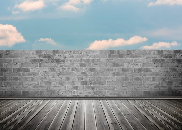 Blue sky over a grey wall